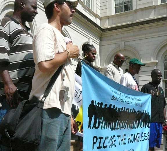 Picture the Homeless protesting on NYC City Hall steps